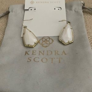 Kendra Scott white and gold dangle earrings